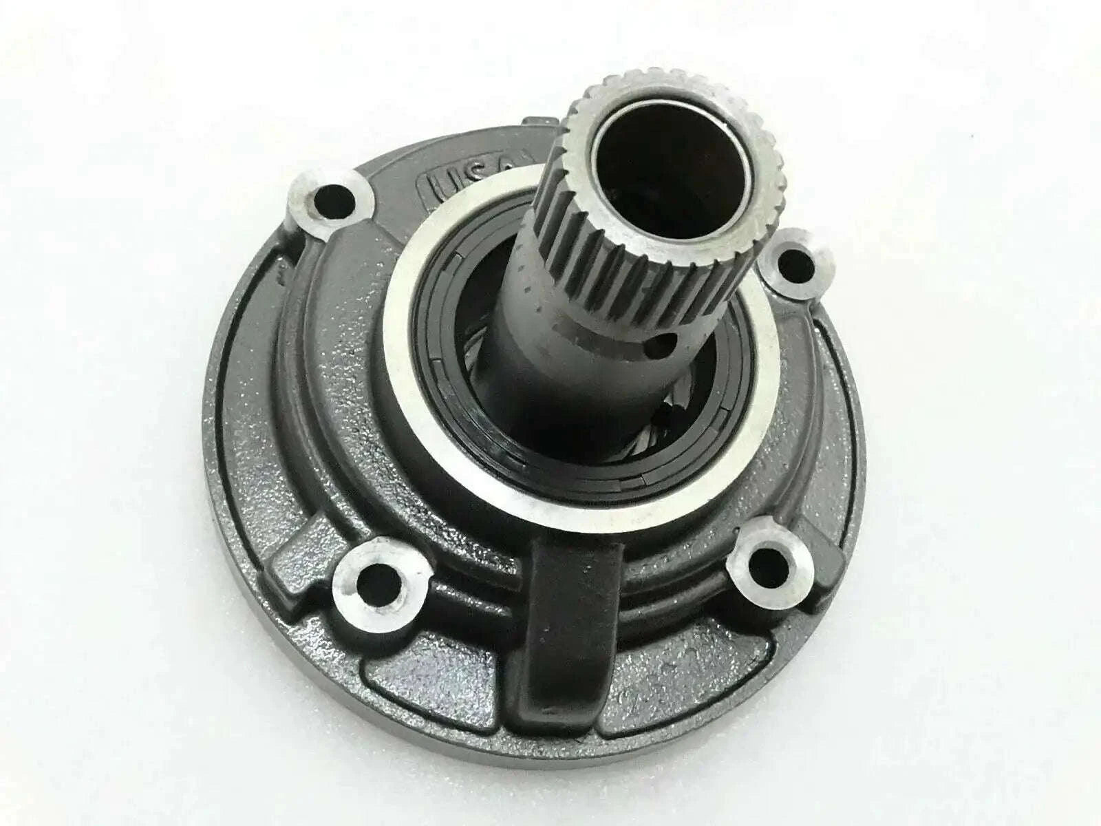 Hydraulic pump transmission, gray metal housing with central black splined inlet
