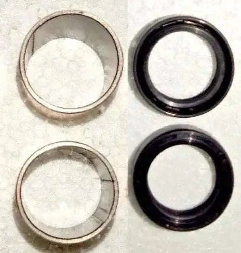 Hydraulic pump seal and bushing kit with metal and black rubber rings