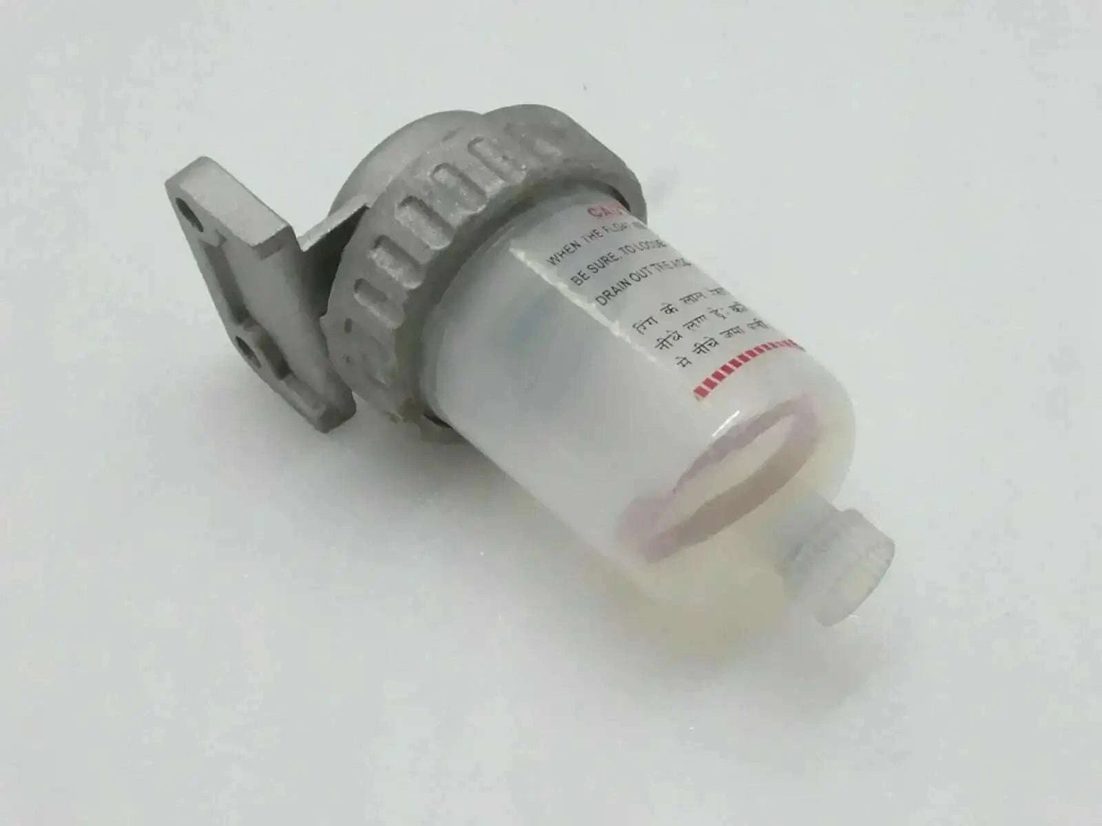 Jcb sediment filter with clear canister and gray mounting bracket, threaded outlet