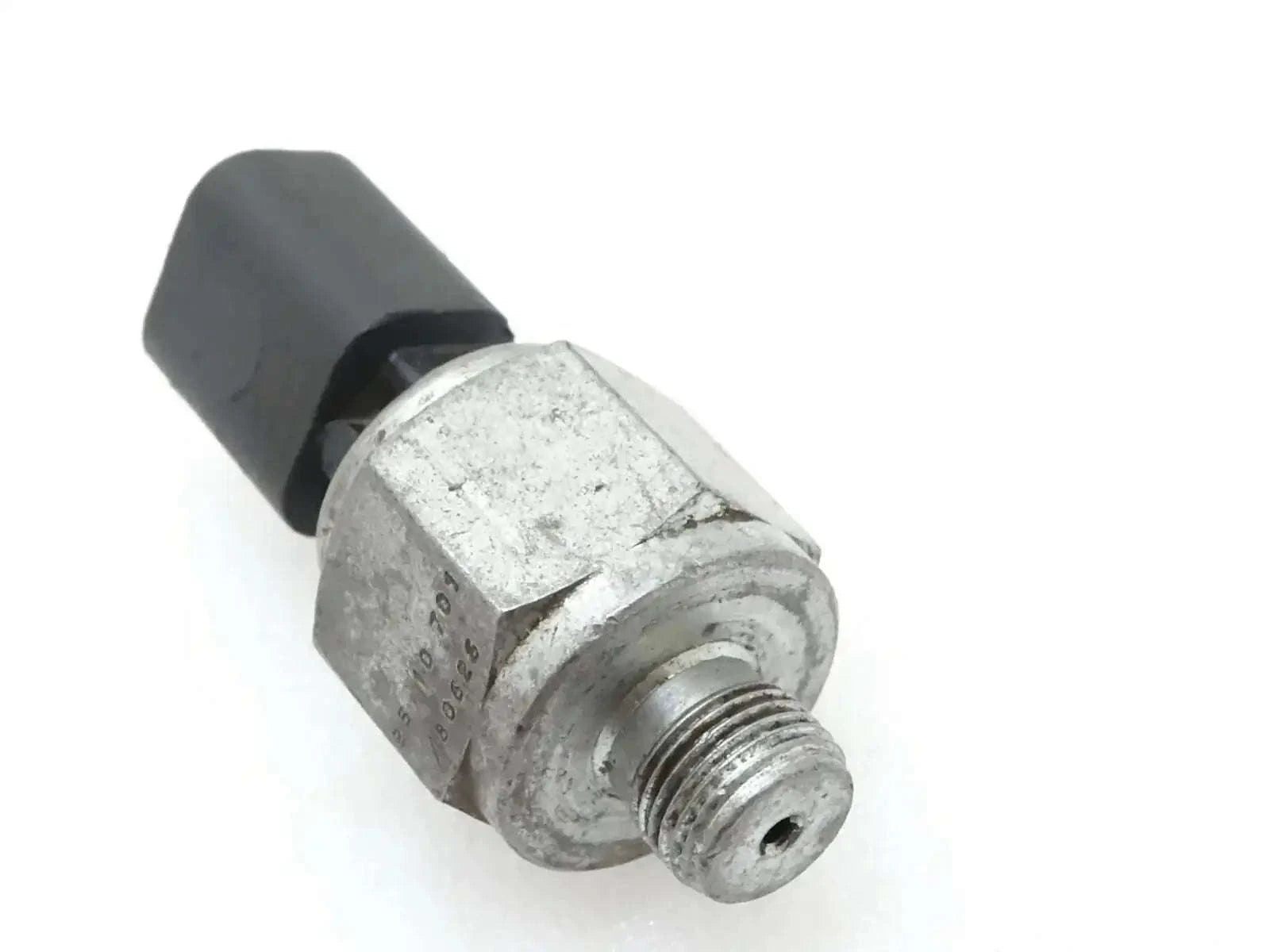 Oil pressure switch with metal body and threaded connector, black plastic cap