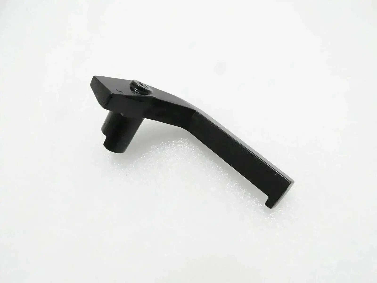 Left window handle, dark gray with mounting stud and screw hole