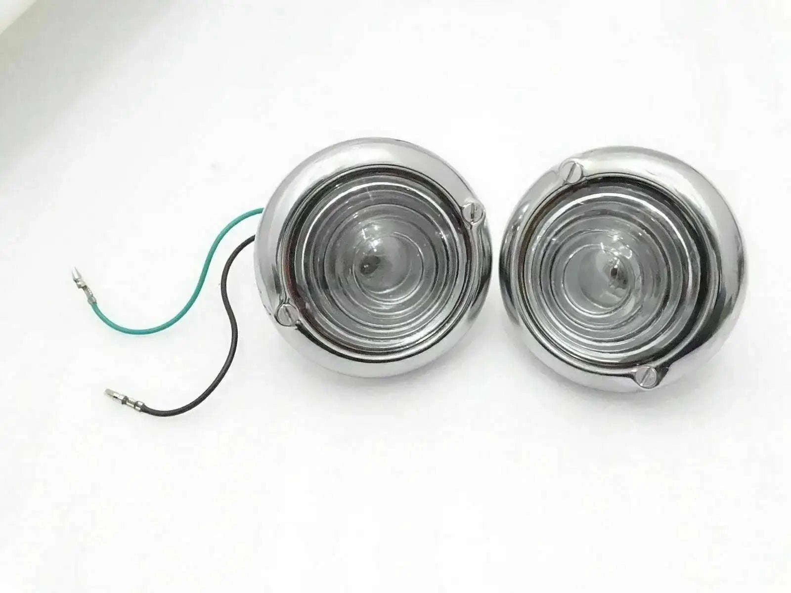 Pair of chrome clear turn signal indicator lights with round lenses