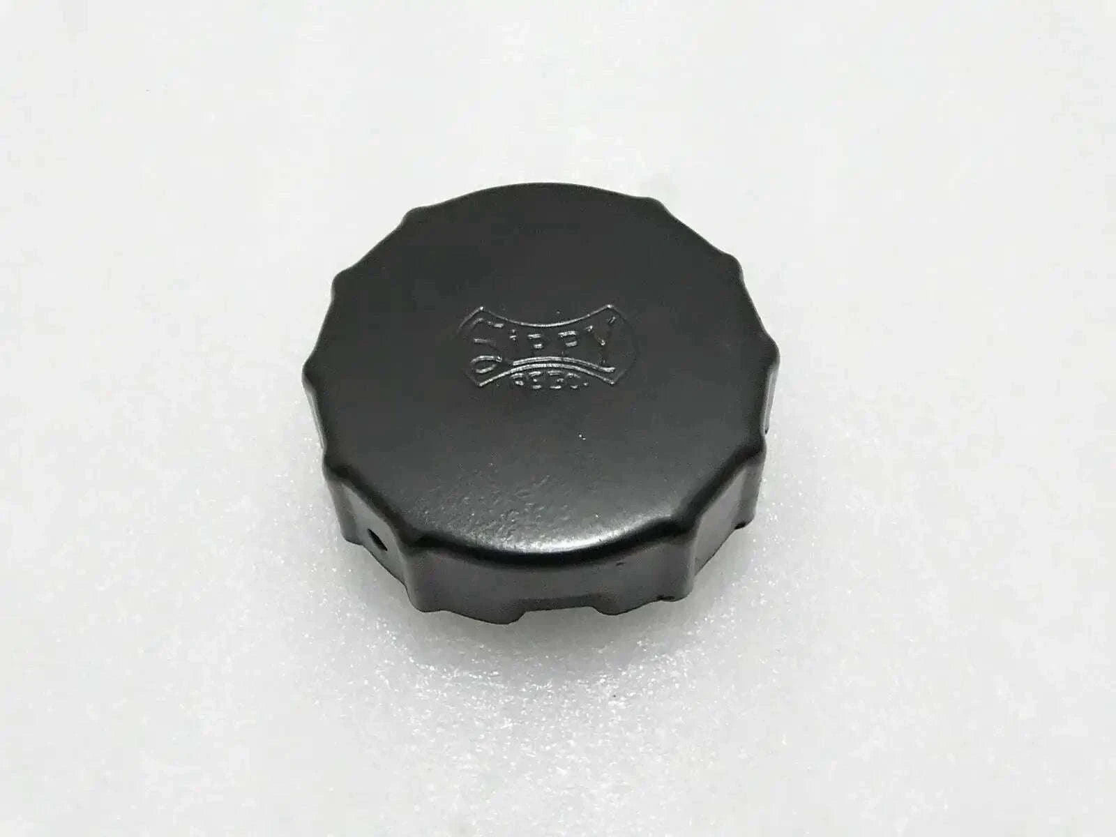 Durable black tractor fuel tank cap designed for Mahindra models.
