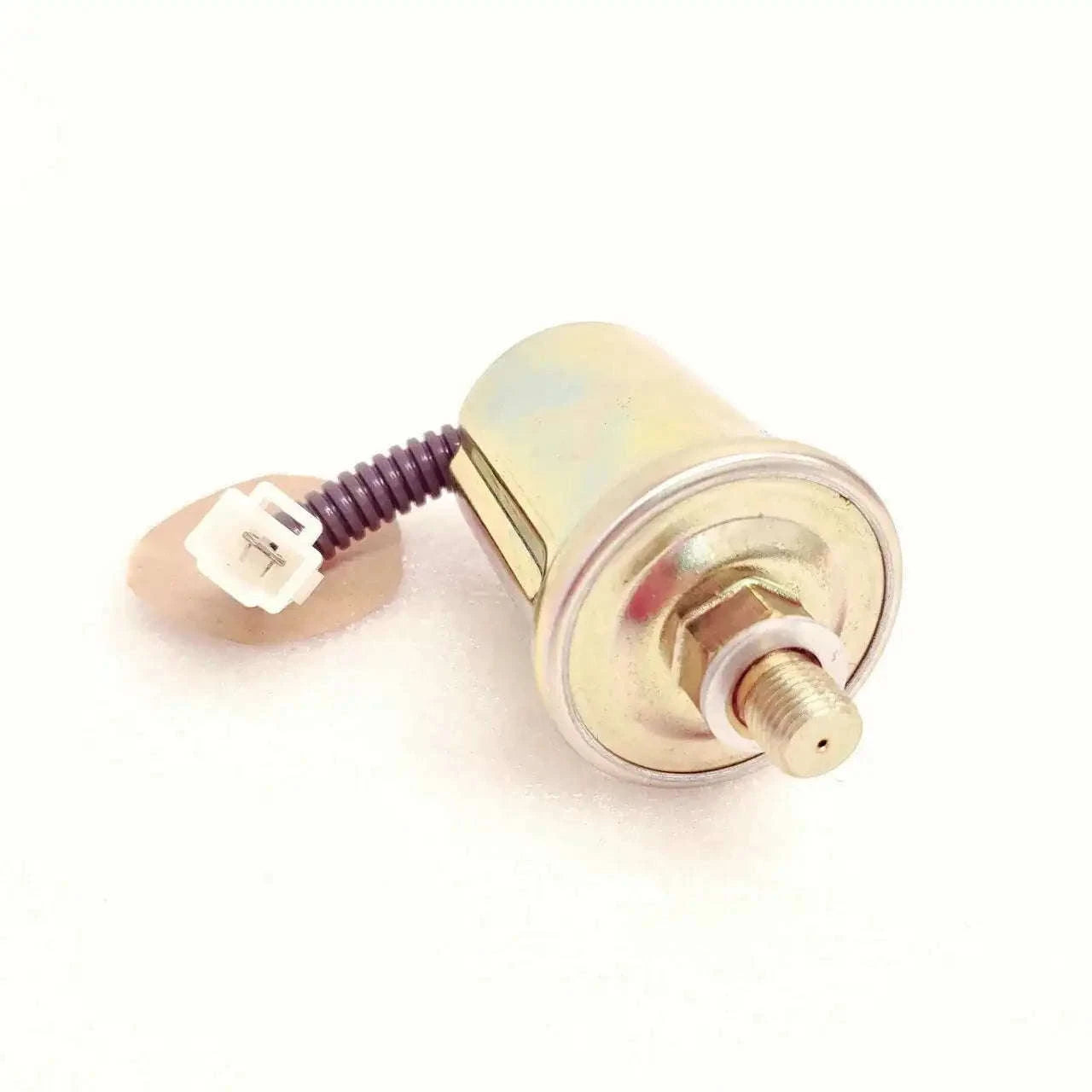 Oil pressure transducer with metal body, threaded fitting, and electrical connector.