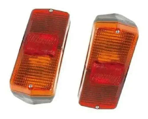 Tractor rear light lens pair with red and amber sections, clear cover and mounting screws