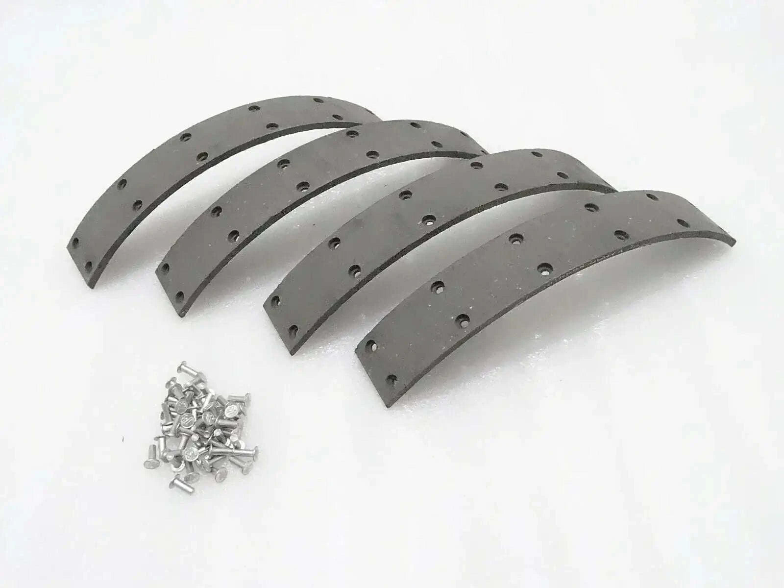 Rubber brake lining shoes set with rivets, curved gray segments
