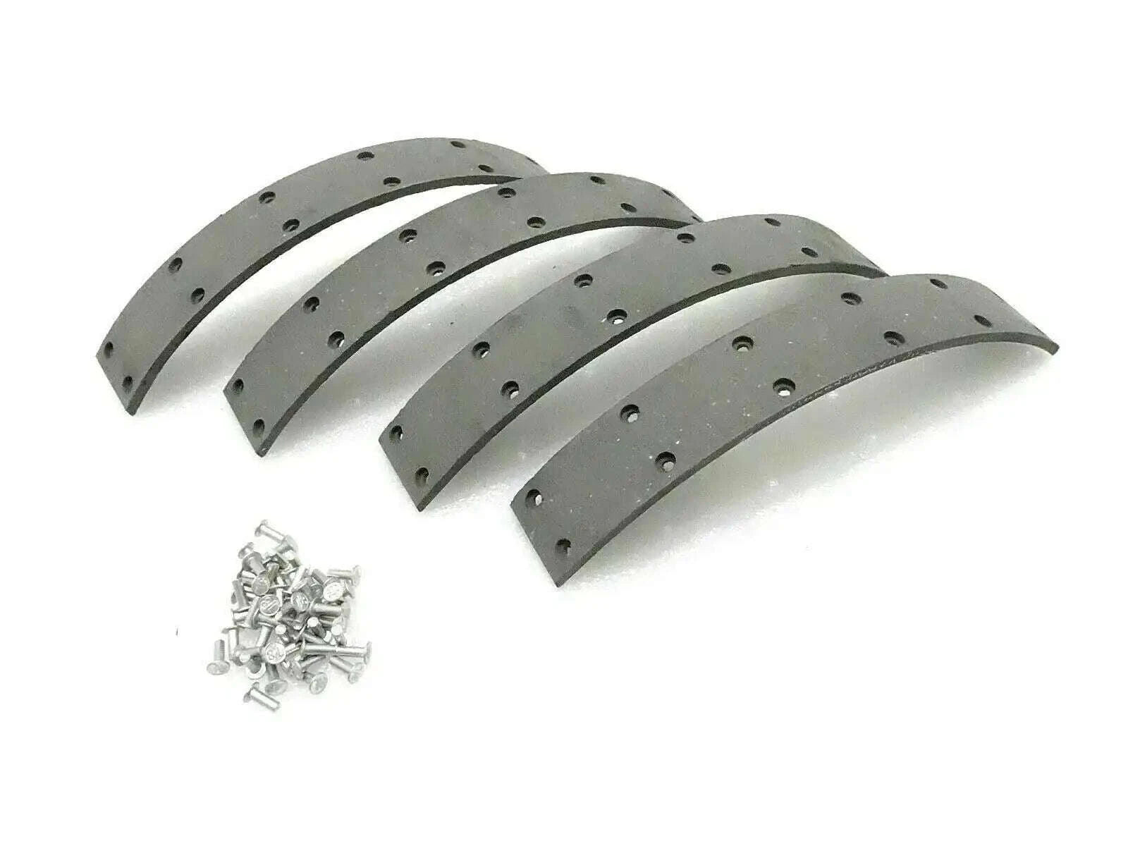 Rubberized brake lining segments with rivets, curved gray pads and small hardware