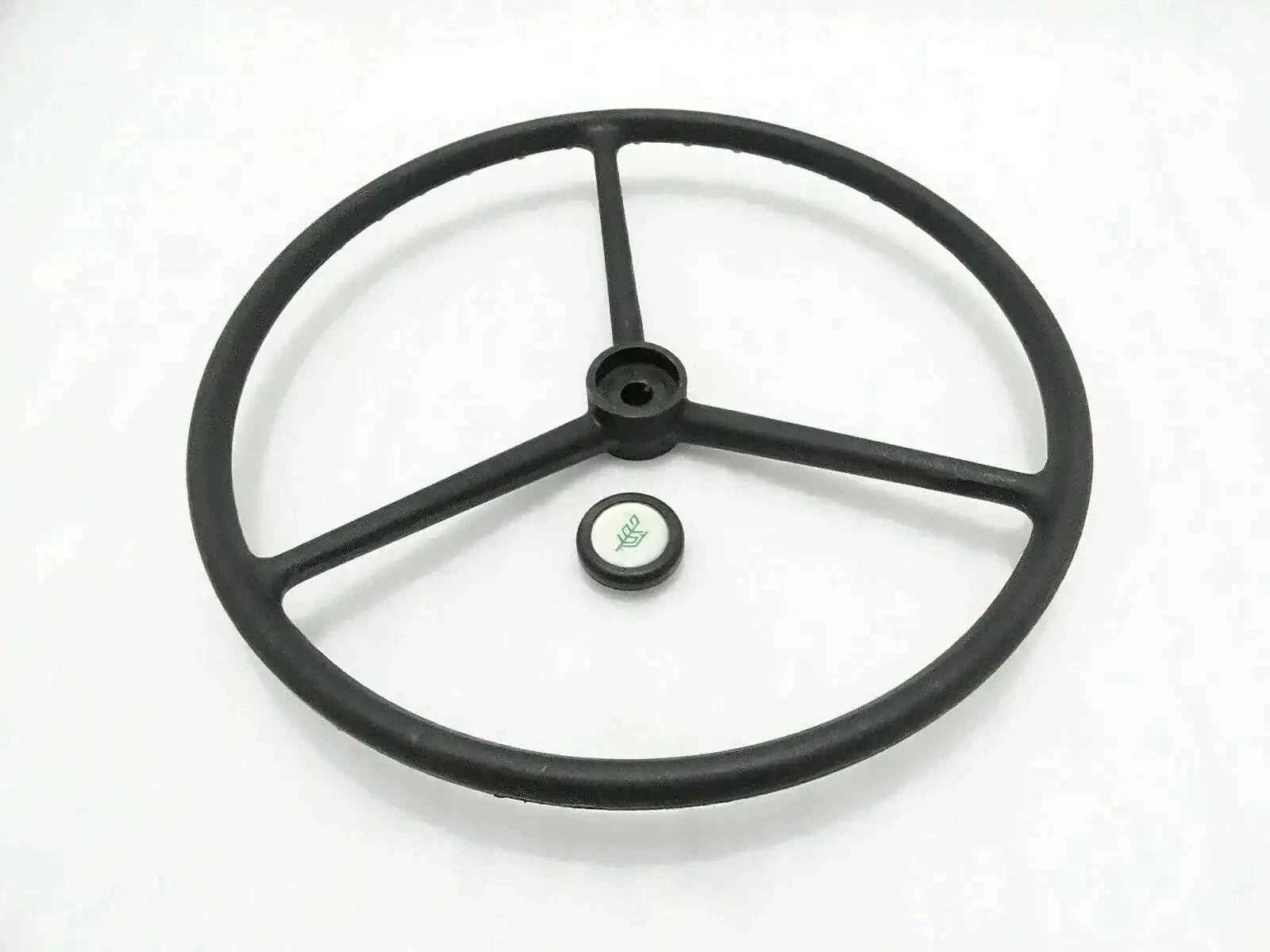 Replacement steering wheel with black rim, three spokes, and center hub cap