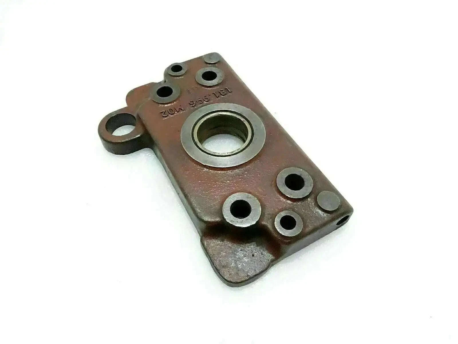Hydraulic pump plate bodyfront with mounting holes and central inlet bore