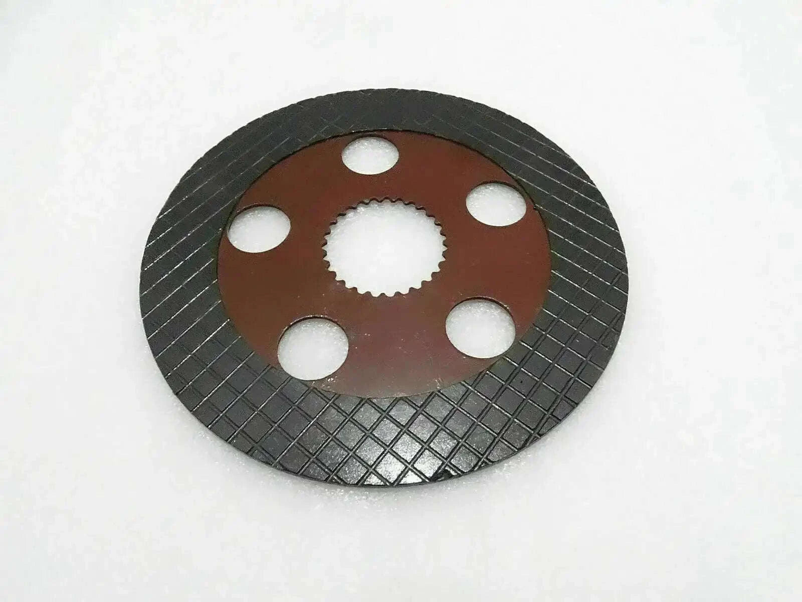 Friction plate with 27-tooth center, dark textured ring, six bolt holes