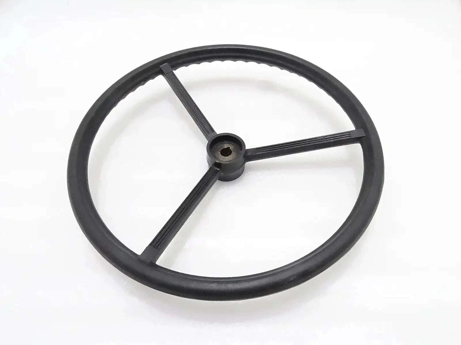 Black steering wheel with three spokes and central hub
