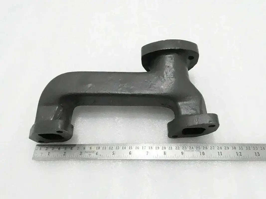 Engine exhaust silencer manifold with two flanged ports, dark gray metal