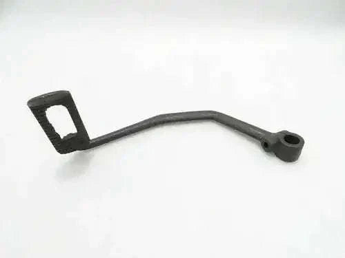 Clutch pedal lever with rubber foot pad and pivot hole, black metal