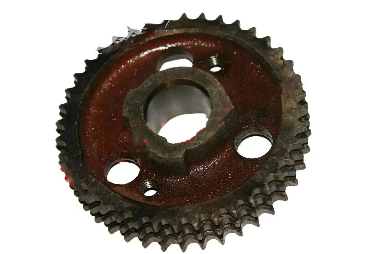 Rust-brown steel sprocket gear with central hub and three mounting holes