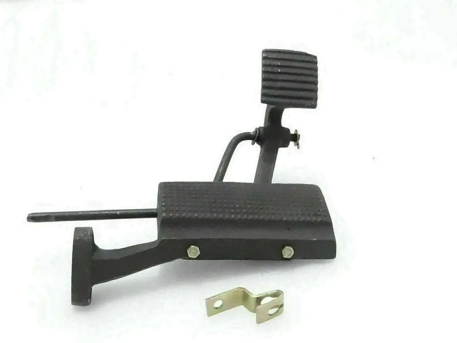 Throttle pedal assembly with black rubber pad and linkage bracket