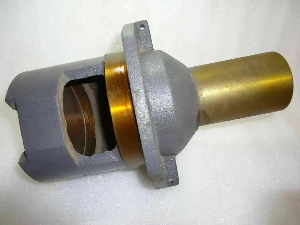 Clutch retainer with gray bracket and gold metal sleeve