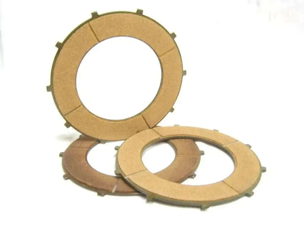 Clutch friction plate set with three circular plates, bronze-brown, with outer notches.