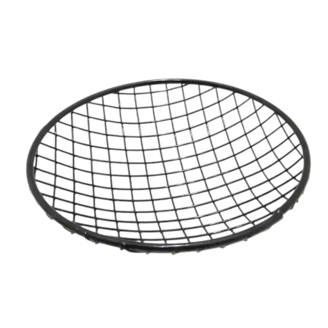 Durable black metal headlight grill accessory with a round mesh design for vehicle customization