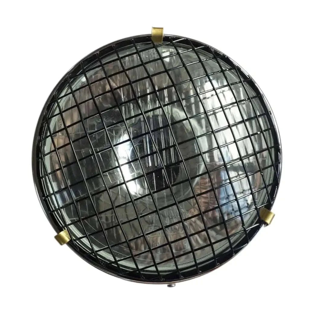 Round headlight grill made of steel mesh, 12 inches, designed for vehicle headlight protection.