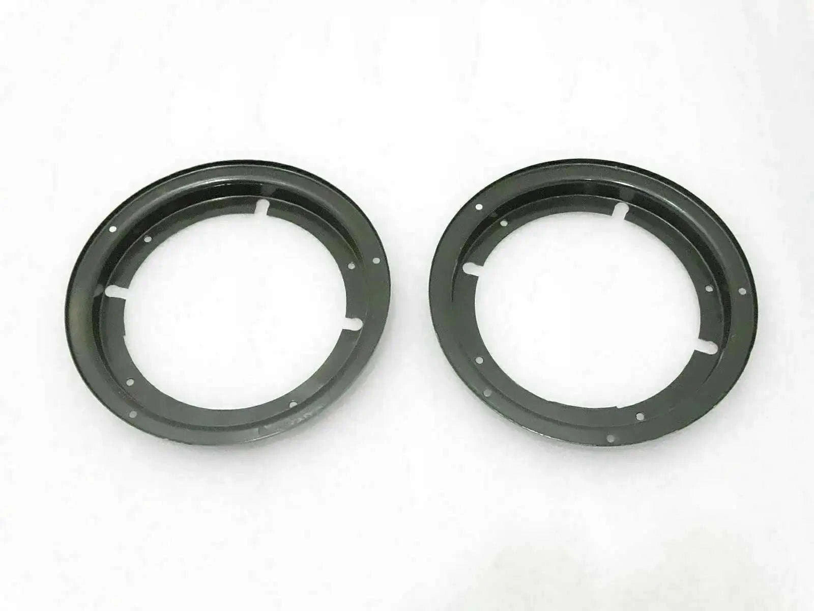 Headlight retaining inner bezel set, two black circular rings with mounting holes