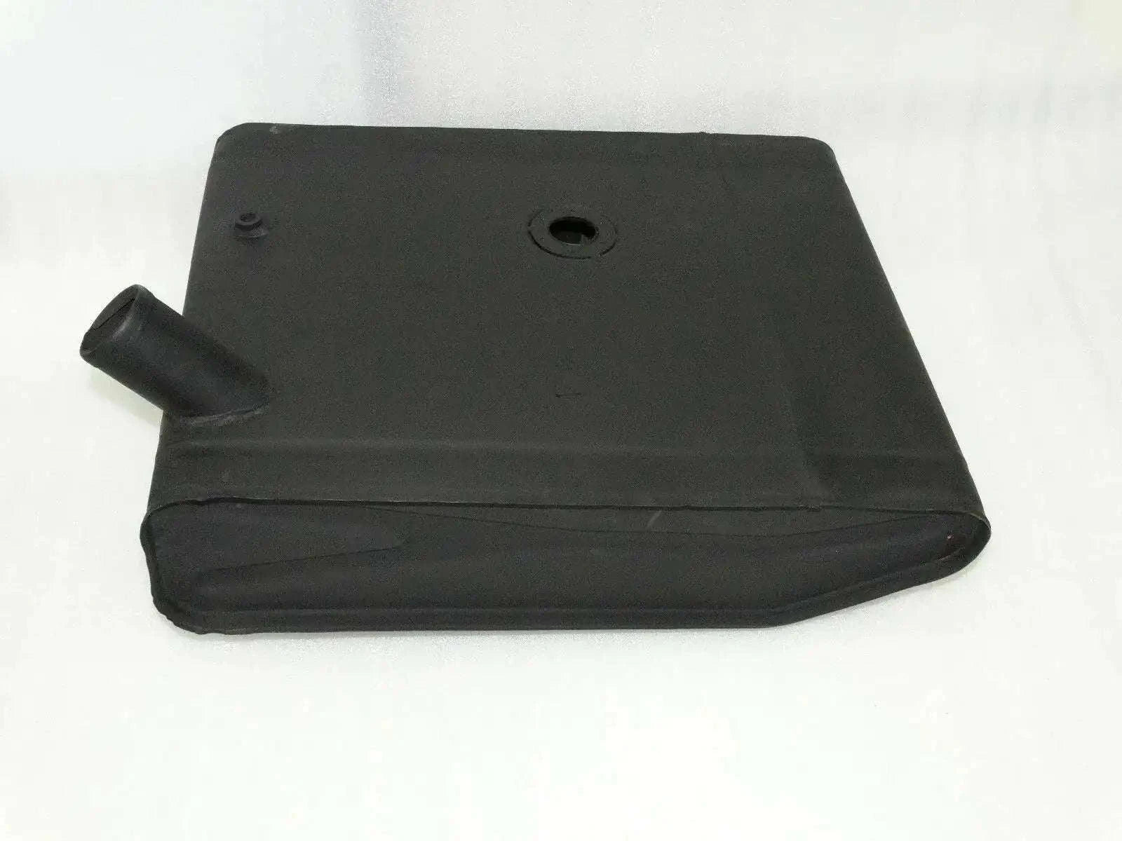 Dark metal fuel tank with cap opening and short filler neck, angled front view