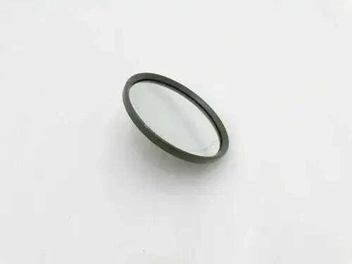 Oval 5-inch mirror with dark rim and reflective glass
