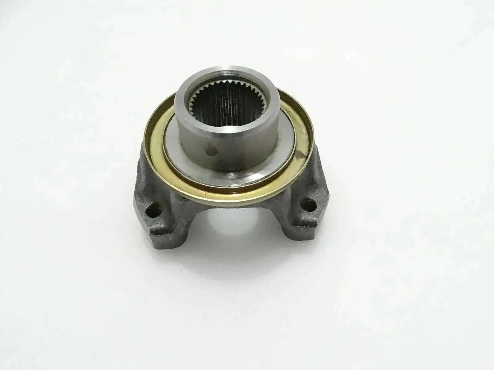 Metal flange yoke bearing with splined inner bore and mounting tabs