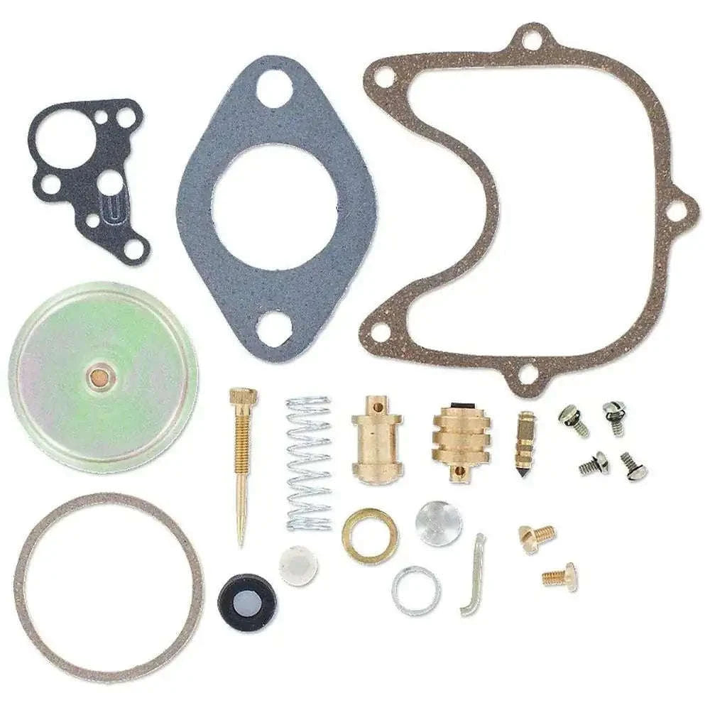 Carburetor rebuild kit with paper gaskets, diaphragm, spring, and small brass parts