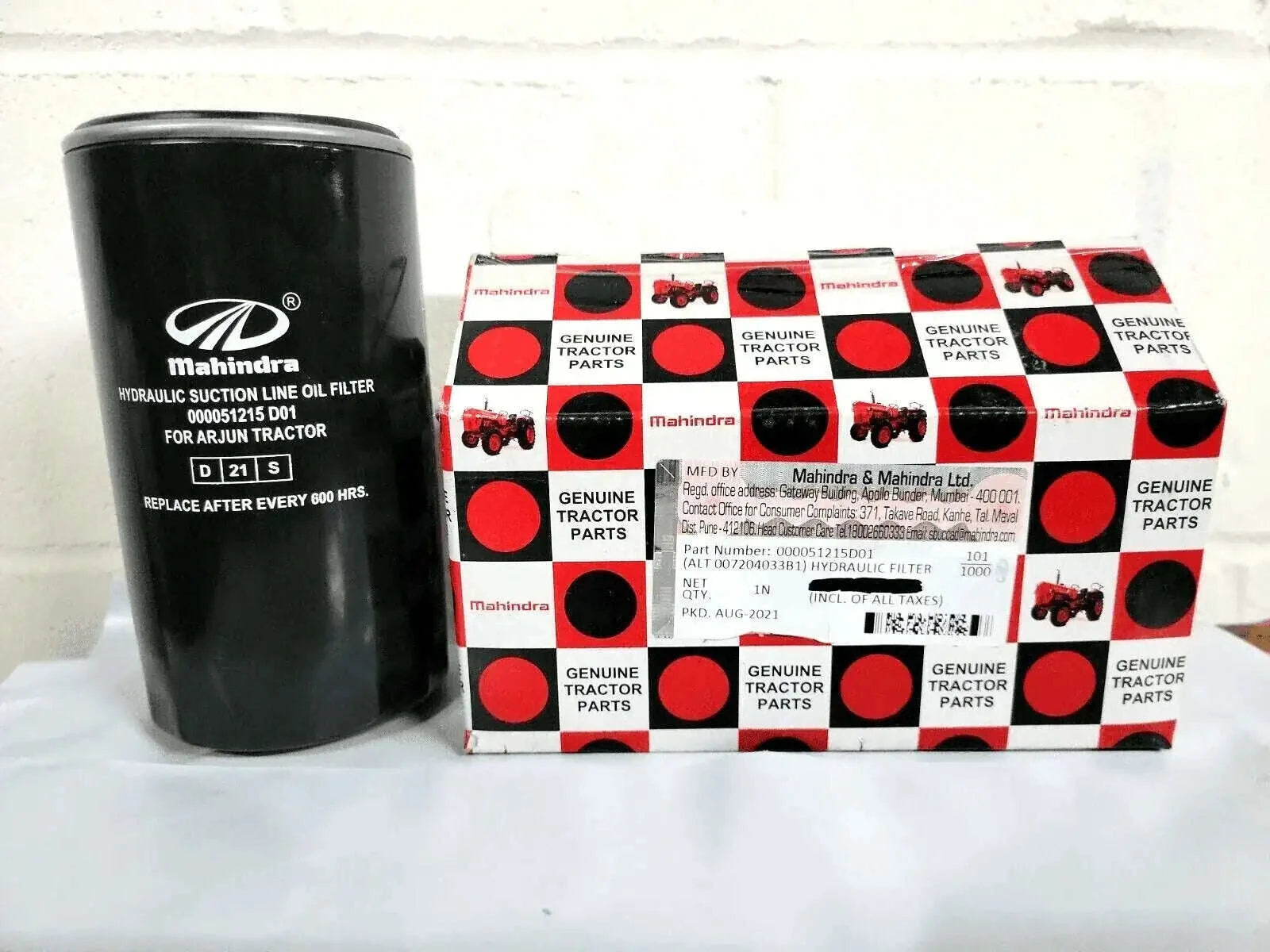 Hydraulic filter cartridge with black canister and Mahindra Genuine Parts box