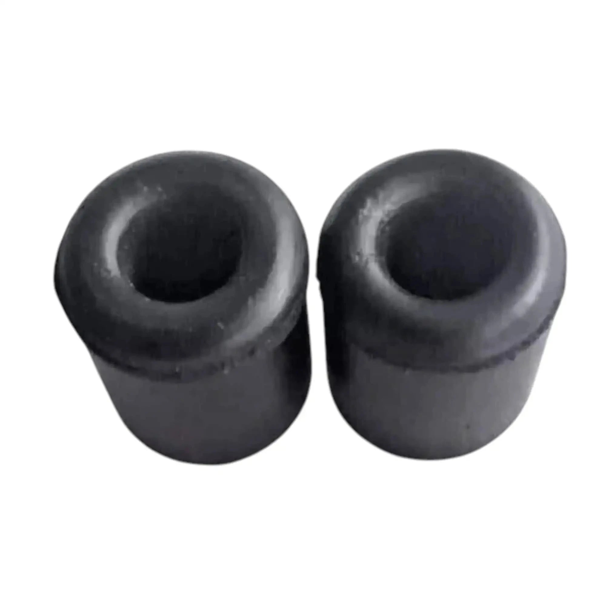 Pair of black rubber grommets with round center openings