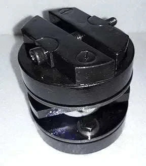 Black circular mechanical coupling with bolts and central hub