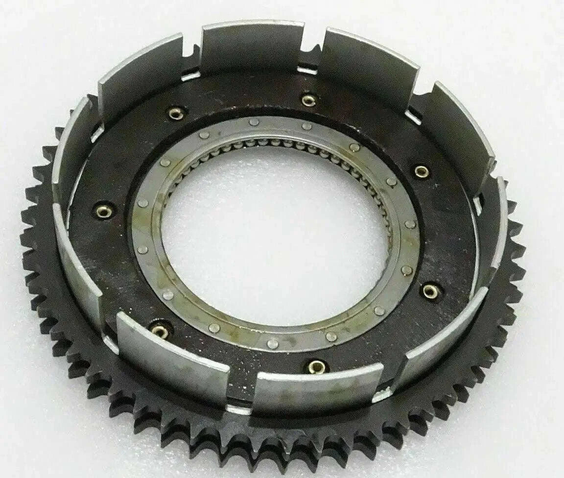 Black metal clutch sprocket and drum assembly with circular ring and mounting bolts