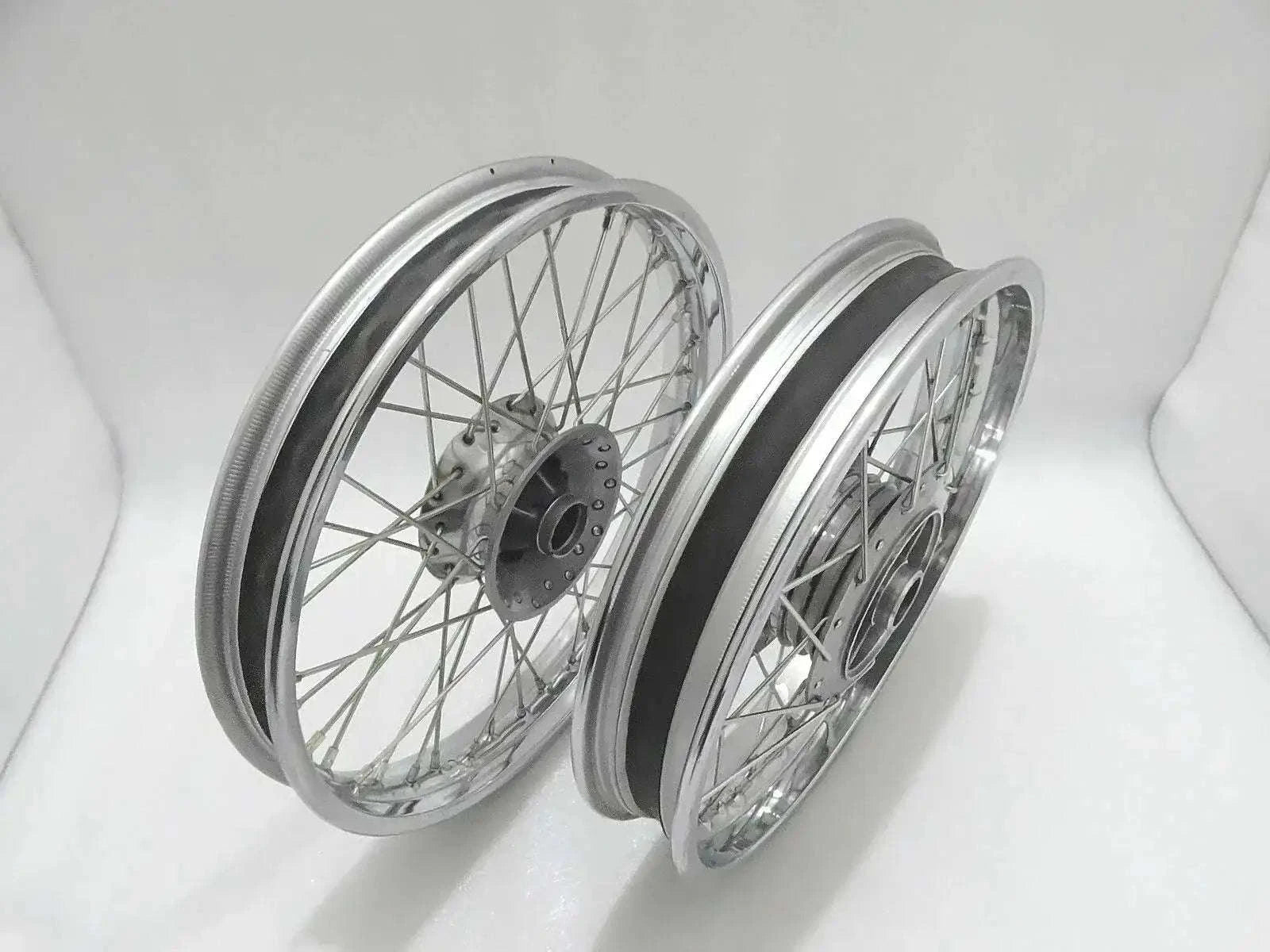 Motorcycle wheel rim set with chrome spoked rims, front and rear views