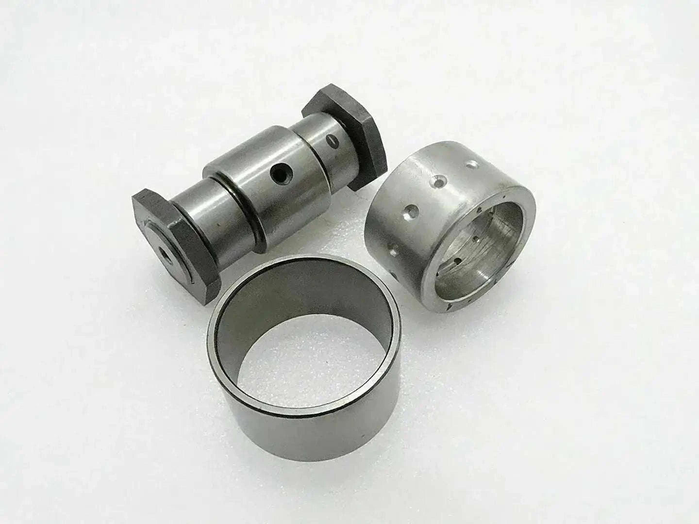 Metal crank pin and bushing set with two nuts and sleeves