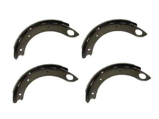 Set of four Ford 2600 brake shoes, durable steel material, designed for reliable tractor braking performance.