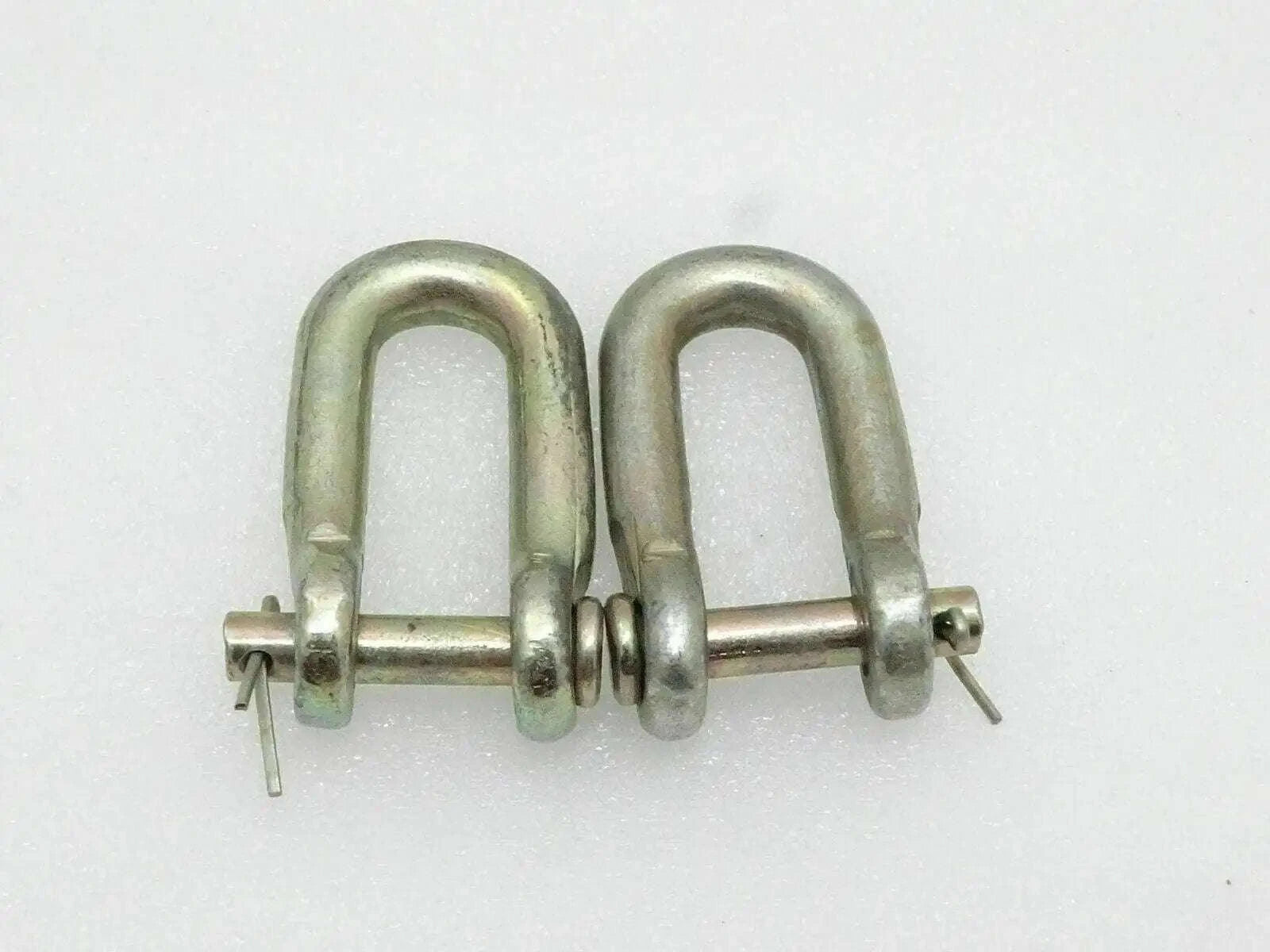 Metal D-shackles with pins and chain link, two-piece assembly