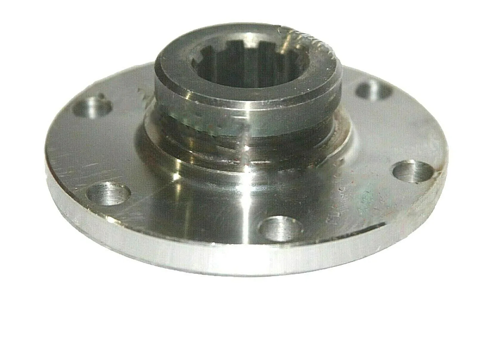 Front axle drive flange with central spline, four mounting holes, metal cog