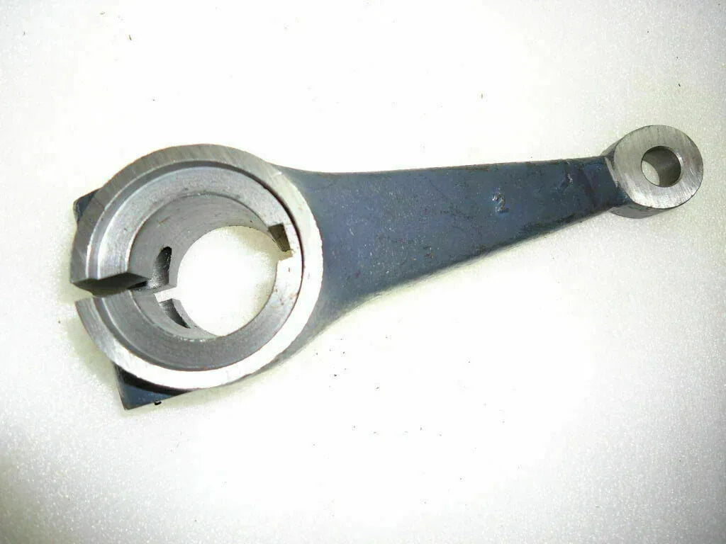 Durable steel front axle spindle arm, precision-engineered for optimal performance in tractors