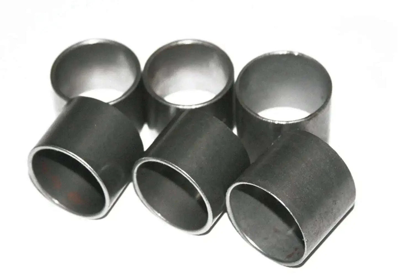 Set of six front fork bushings, dark metal cylindrical sleeves