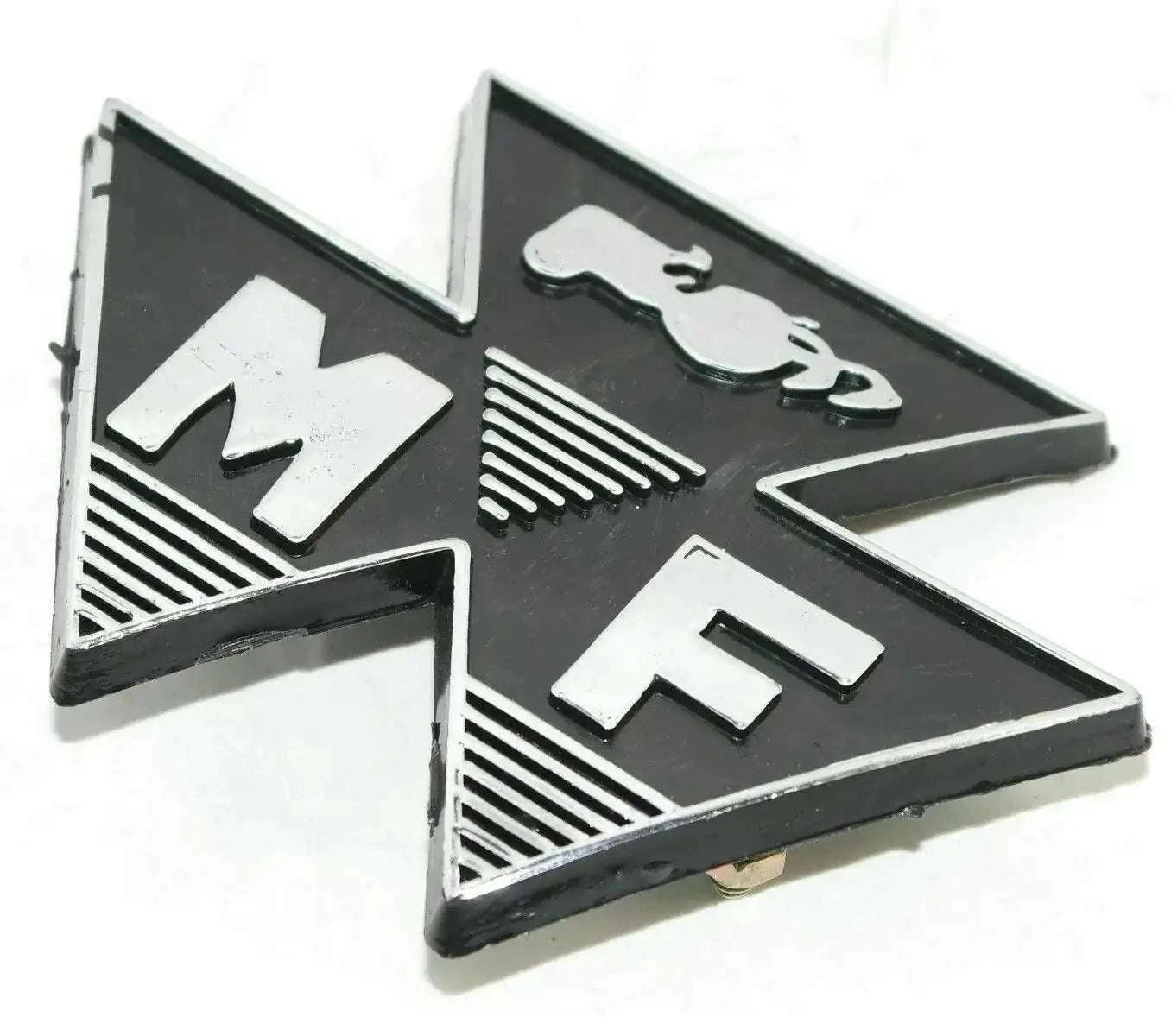 Black tractor front badge with silver Massey Ferguson-style logo and grille details