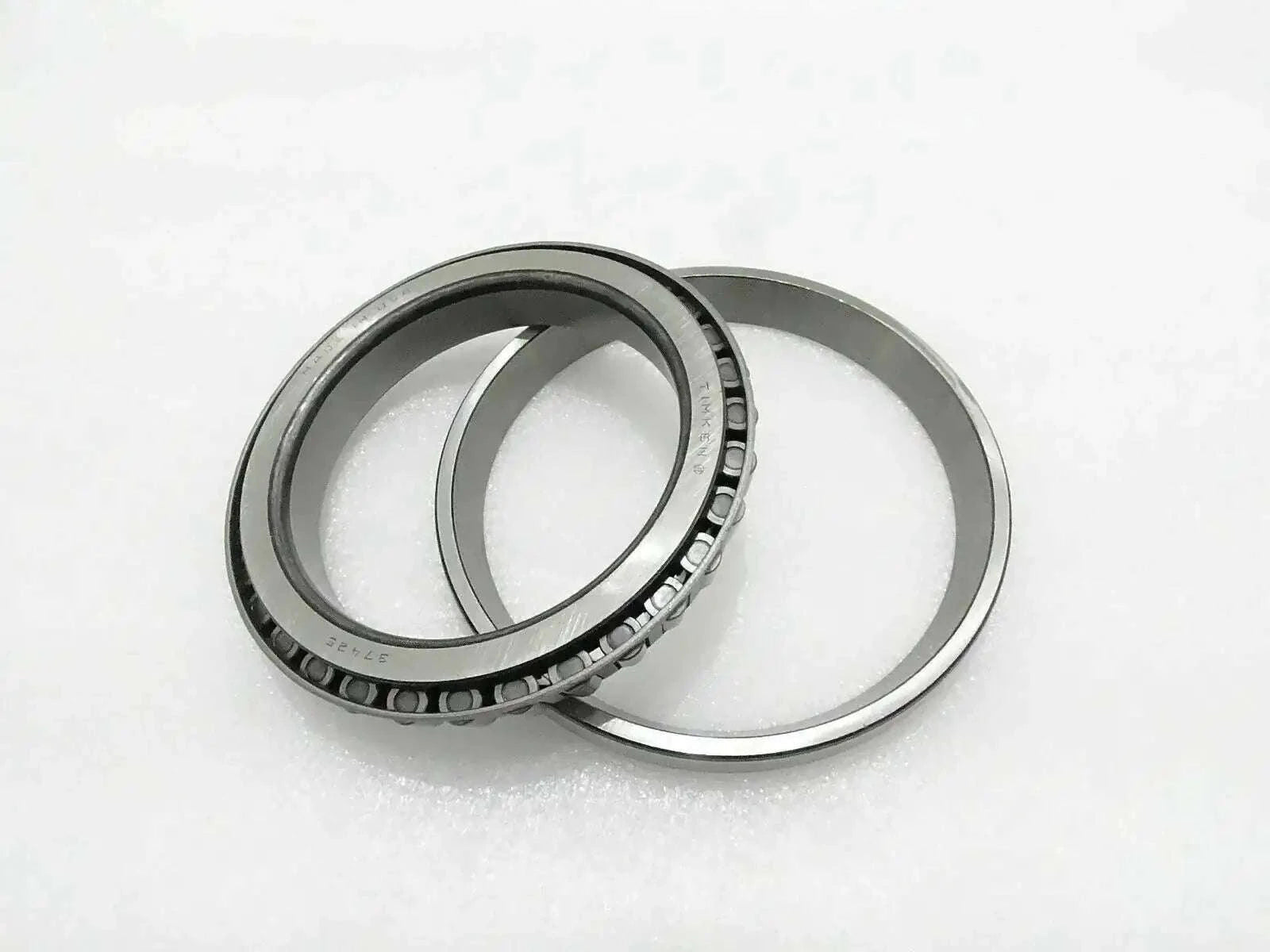 Hub bearing roller set with two metal rings