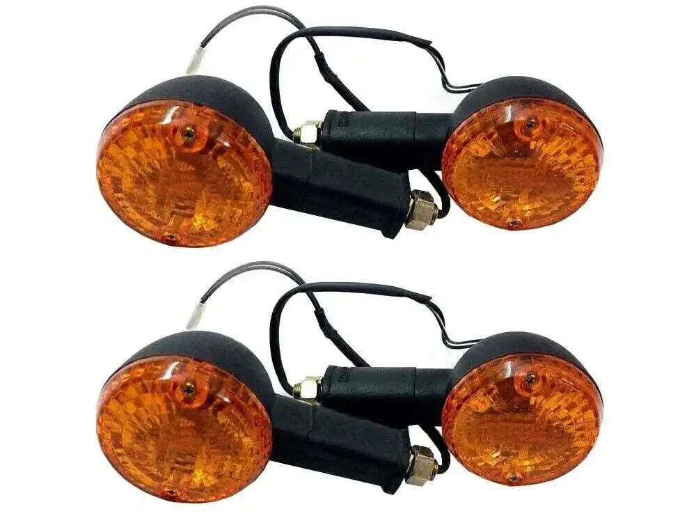 Black front and rear indicator light assembly with amber oval lenses and wiring