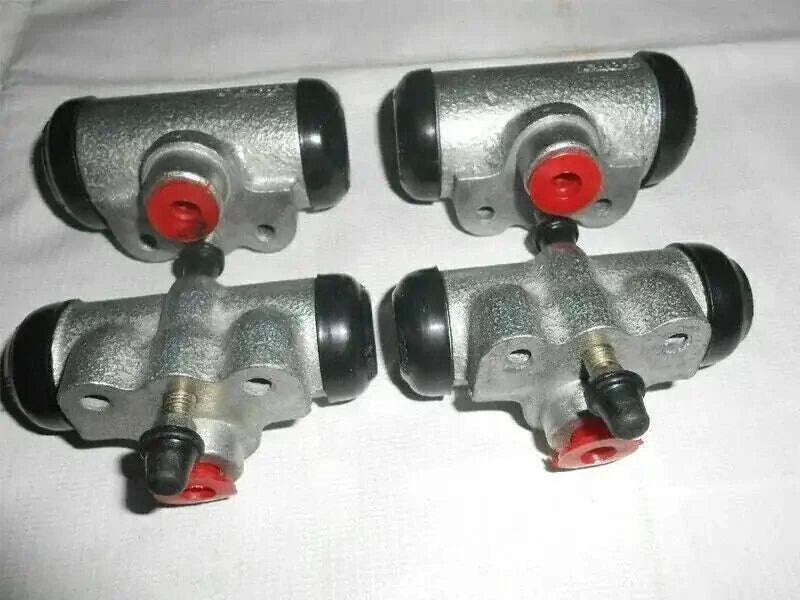 Brake wheel cylinder assembly with four silver cylinders and red dust caps