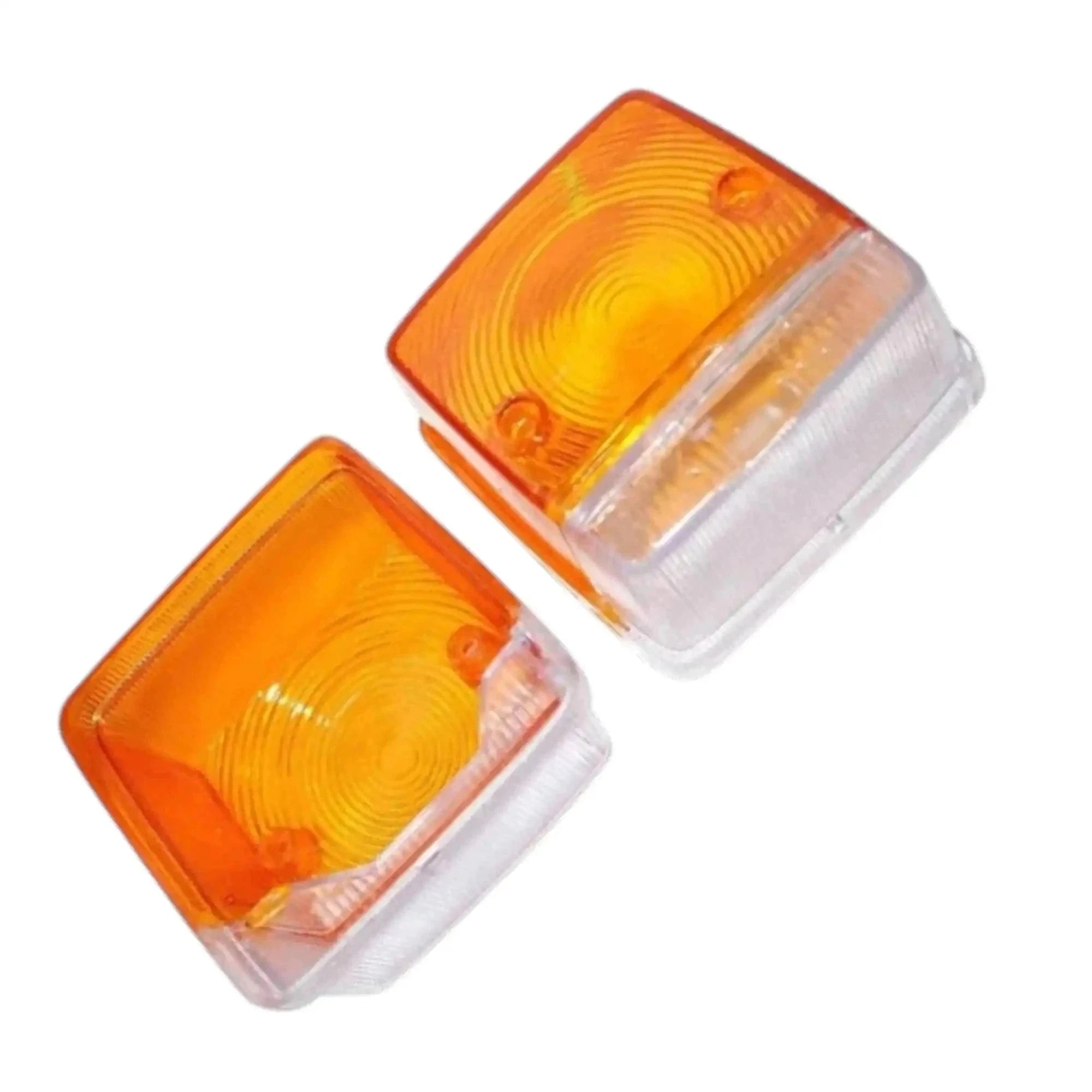Two lamp lens covers with amber orange lenses and clear outer edges