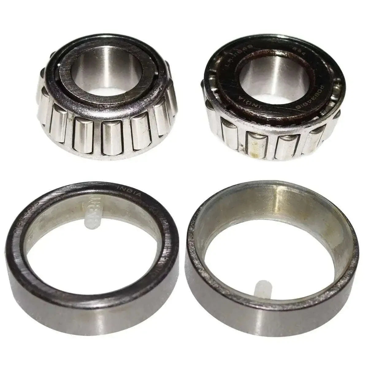 Front wheel bearing kit: two steel bearings and two metal collar rings