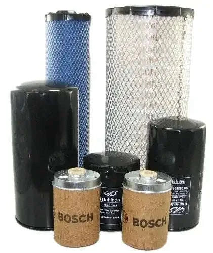 Tractor filter pack with several cylindrical filters, mesh sleeves, and BOSCH labels