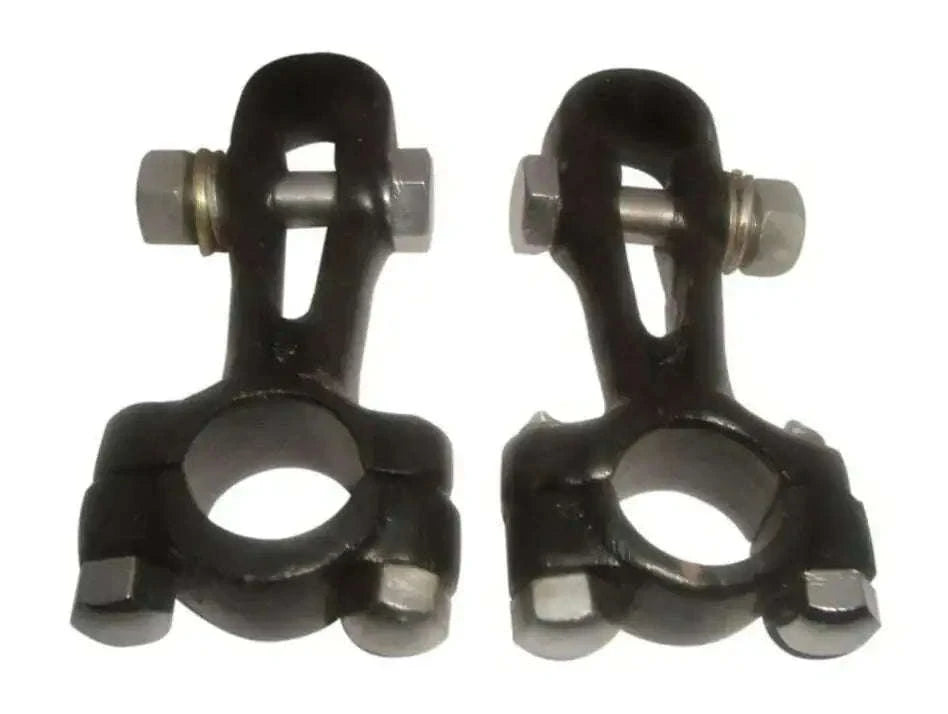 Pair of black 7/8-inch handlebar fork clamps with mounting bolts