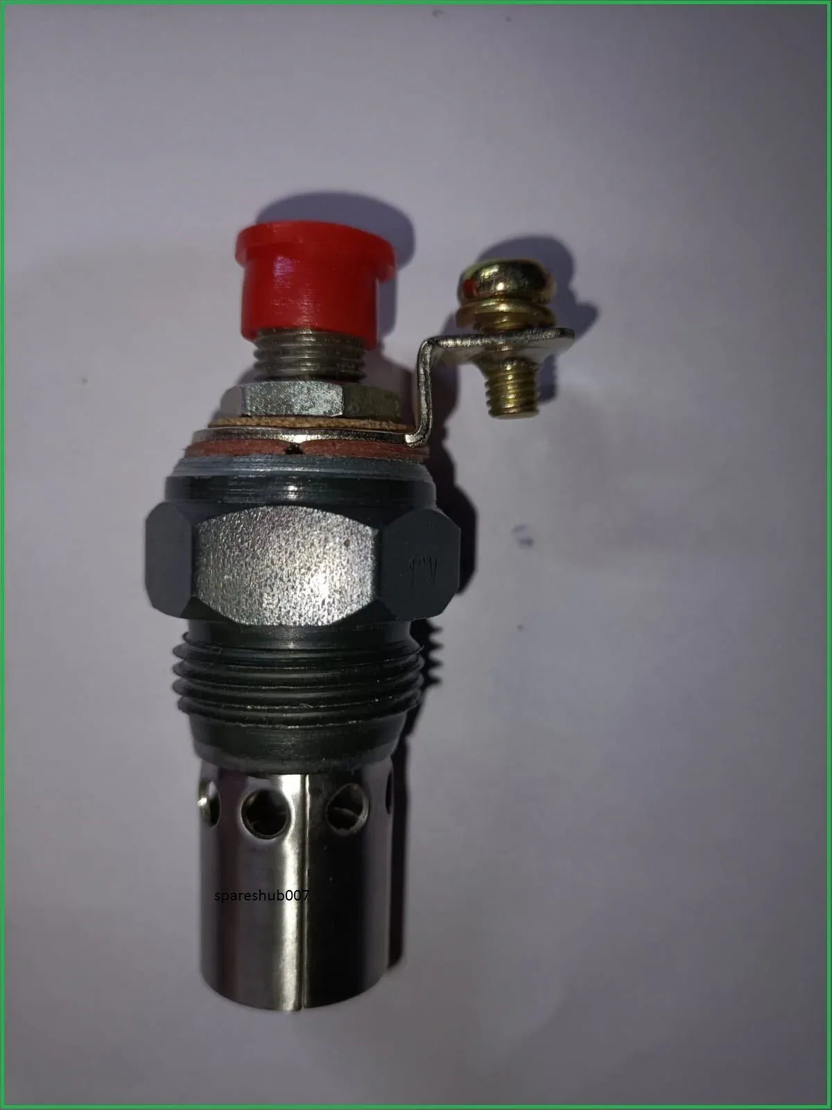 Tractor glow plug, metal construction, compact size, used for efficient engine startup