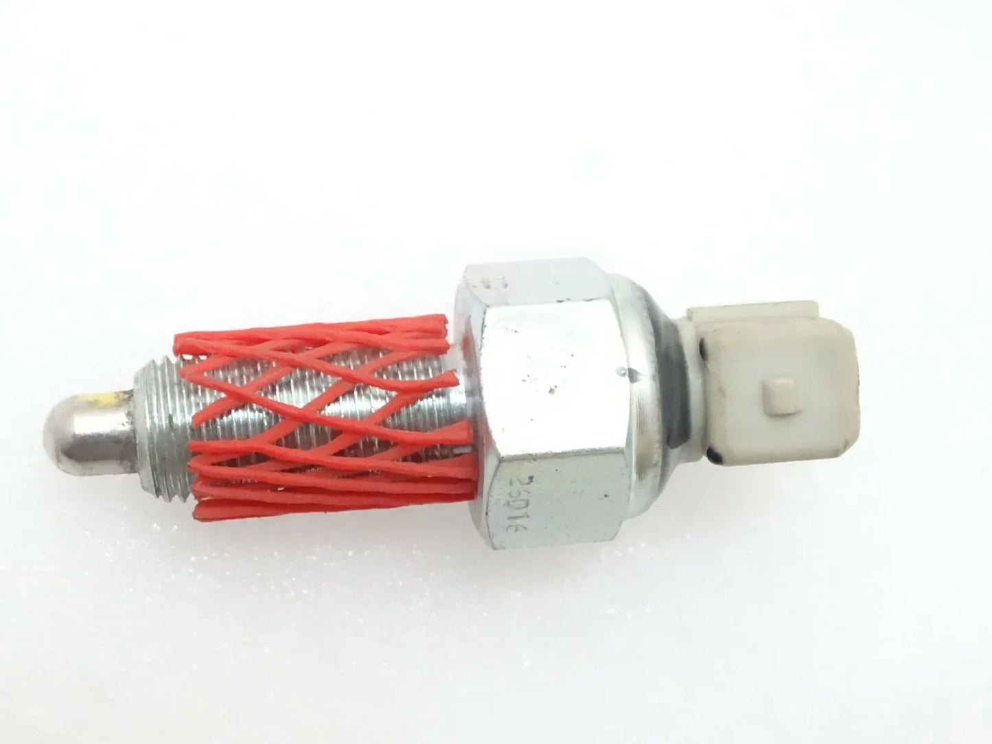 Metal hand brake switch with red wire coil and white plastic connector