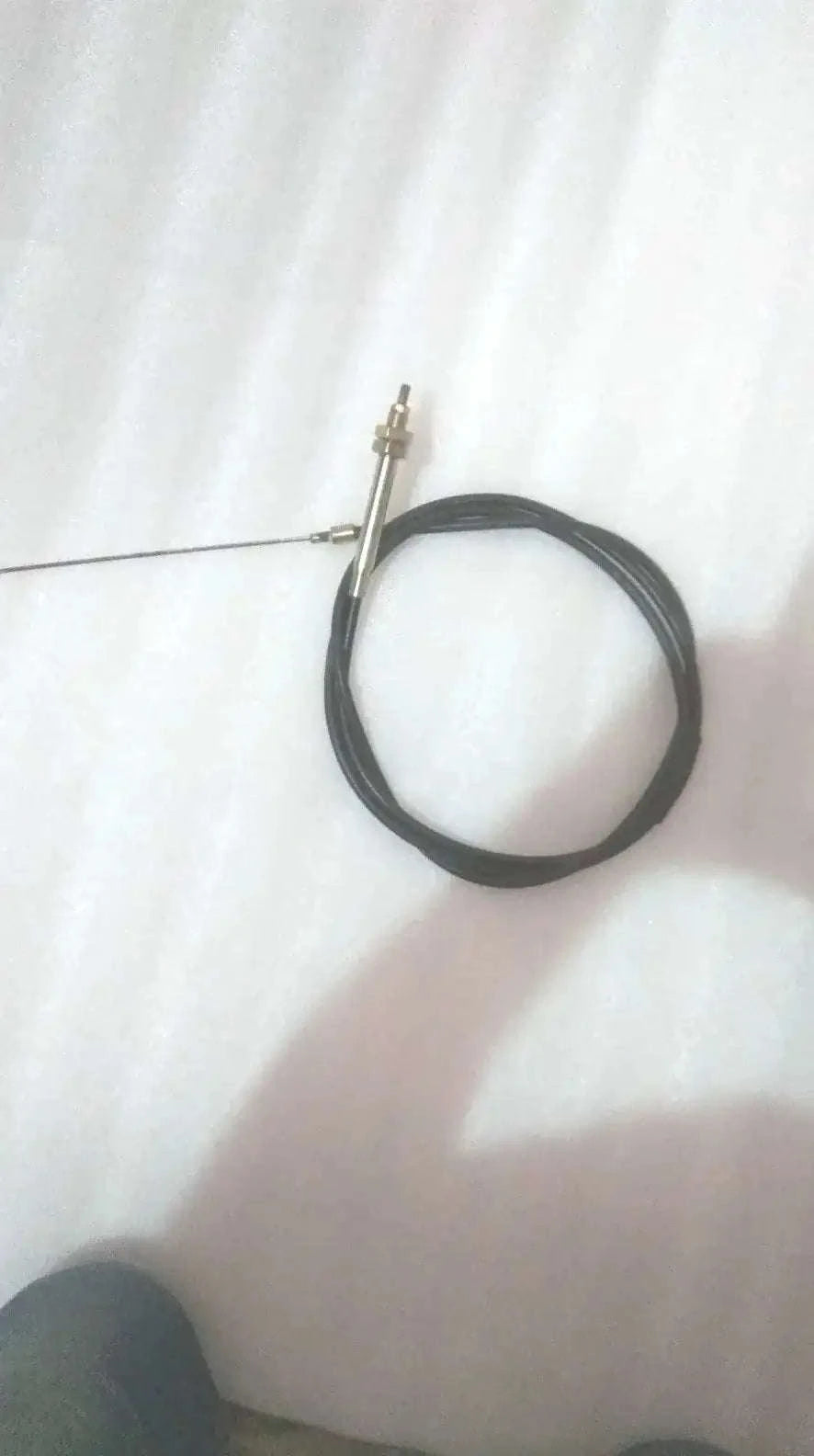 Handbrake cable for JCB 3CX, black cable with metal connector end